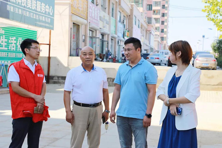 乾港集团，公益行动，公益活动，扶贫，环保集团，慰问老人，救助残疾人
